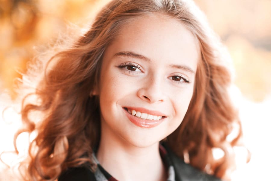 Young girl with healthy teeth
